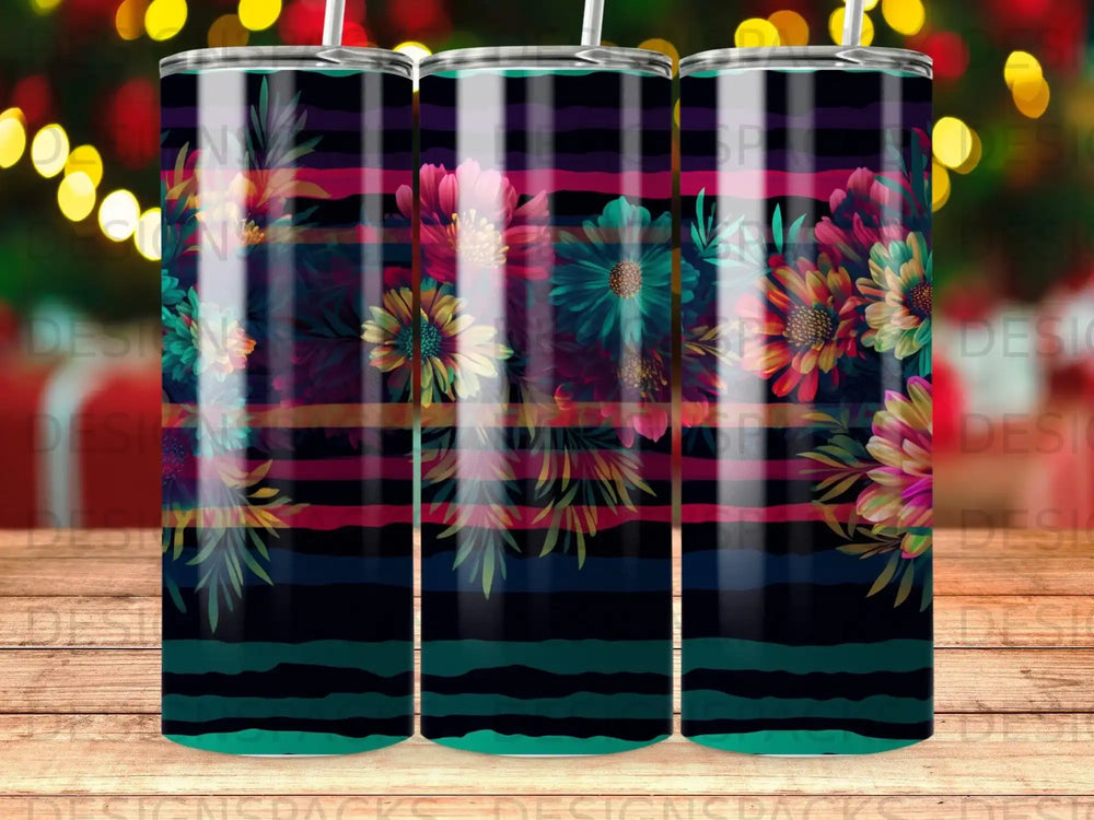 Floral pattern tumbler with dark stripes and vibrant colorful flowers.