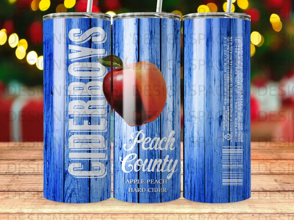 Ciderboys Peach County Apple Peach hard cider tumbler with blue woodgrain background.