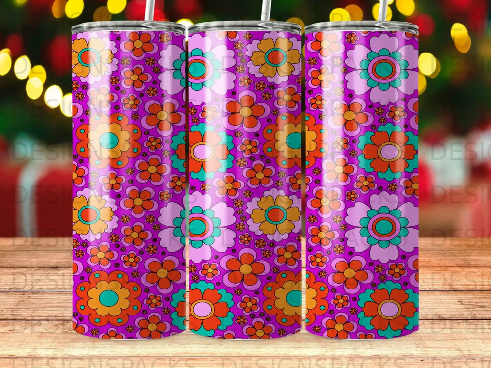 Purple tumbler with a repeating psychedelic floral pattern.