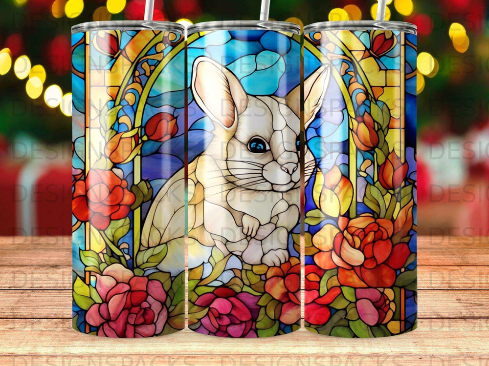 White rabbit in stained glass window surrounded by pink and red roses.