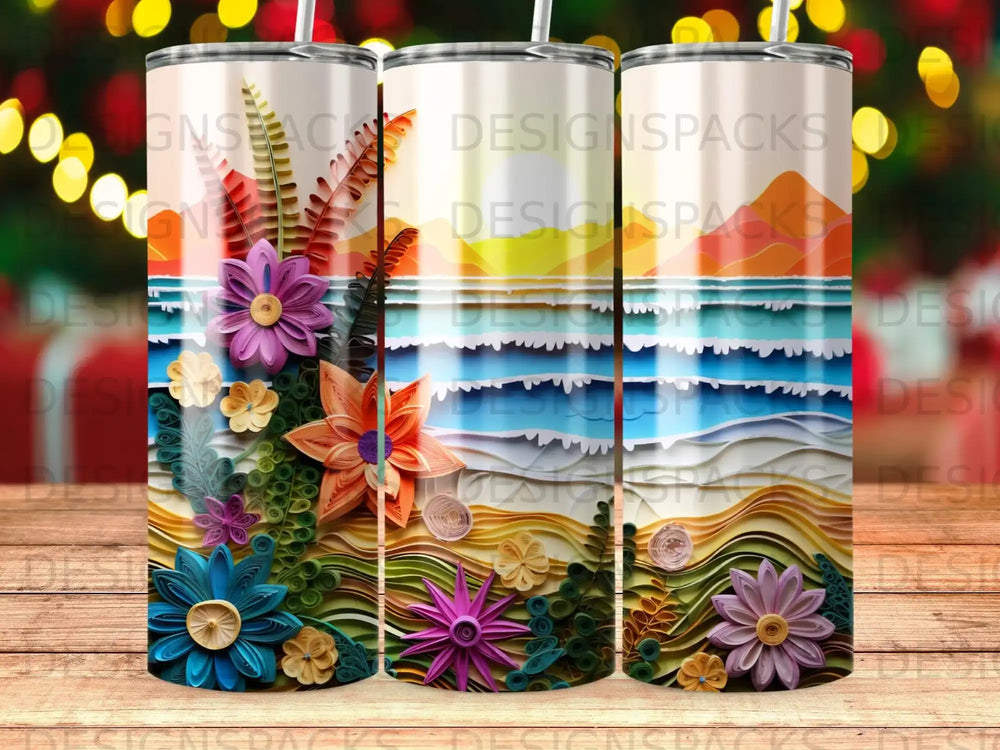 Three tumblers with layered floral and beach scene designs.