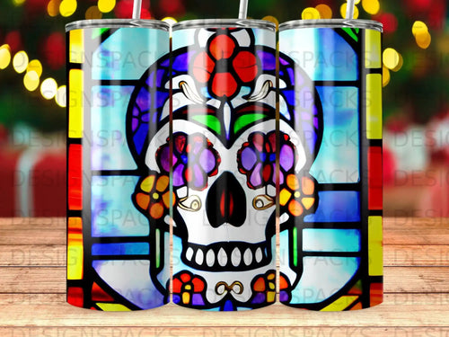 Stained glass skull with floral accents and colorful background.