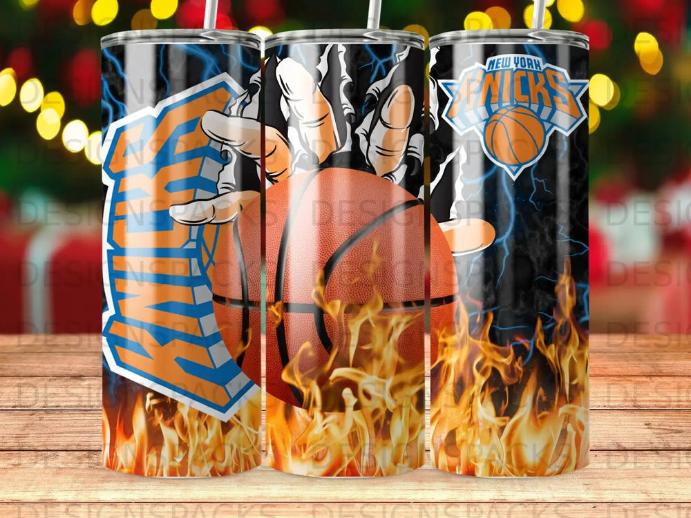 New York Knicks basketball and flames on a tumbler.