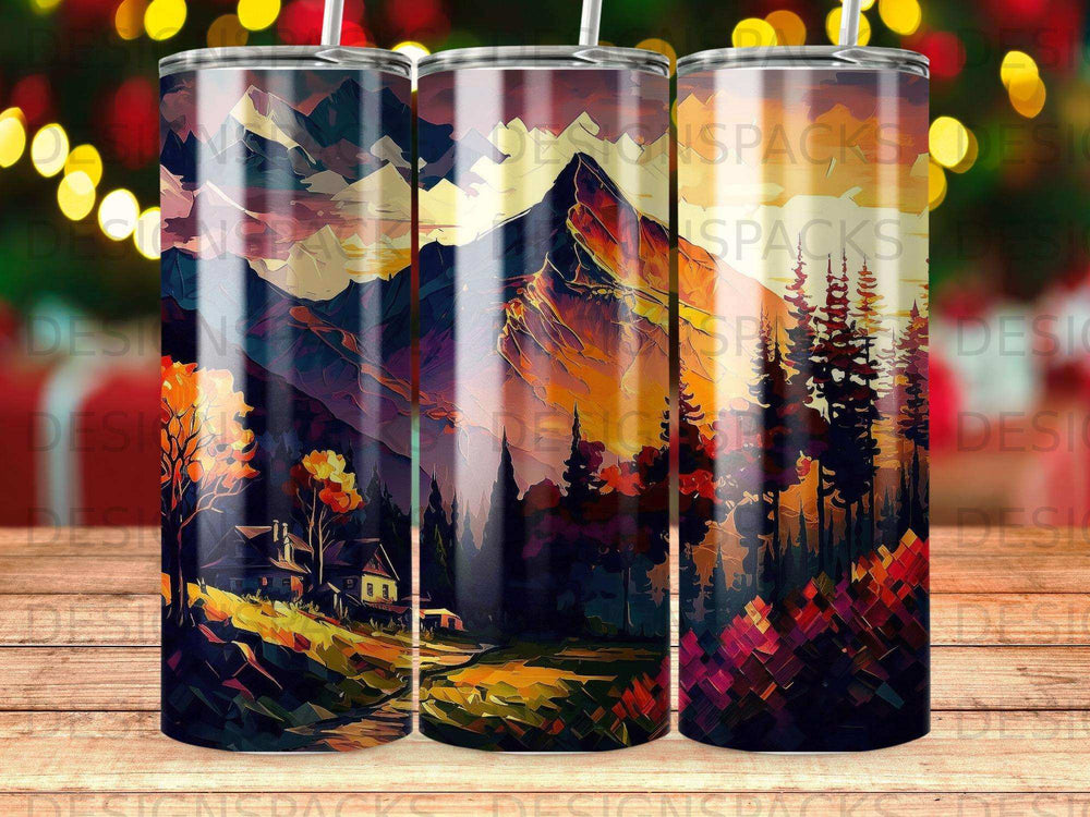 Tumbler with mountain landscape and trees, featuring warm sunset colors.