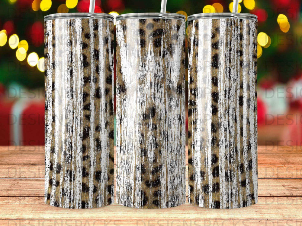 Three tumblers with leopard print and distressed wood pattern.