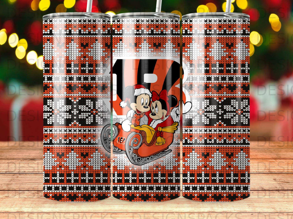 Mickey and Minnie Mouse in Santa hats on a sleigh with a Cincinnati Bengals logo.