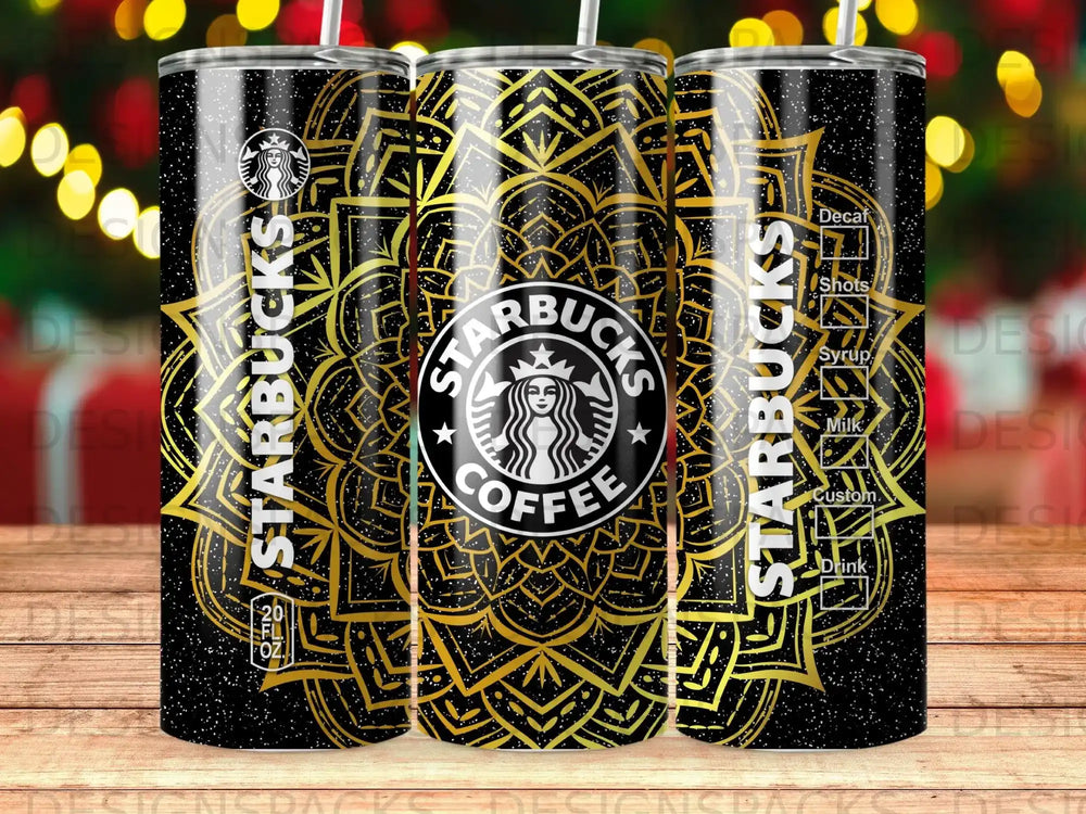 Starbucks tumblers with black and gold mandala design.