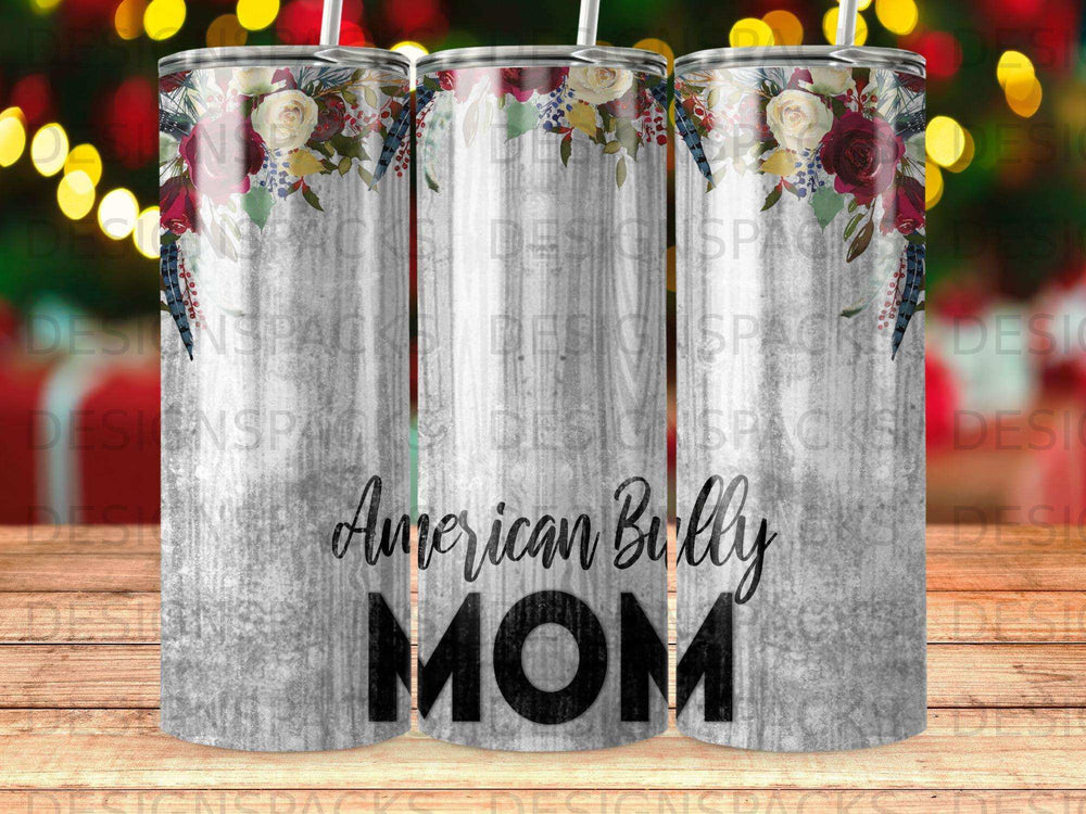 Tumbler with "American Bully MOM" text and floral design on a gray background.
