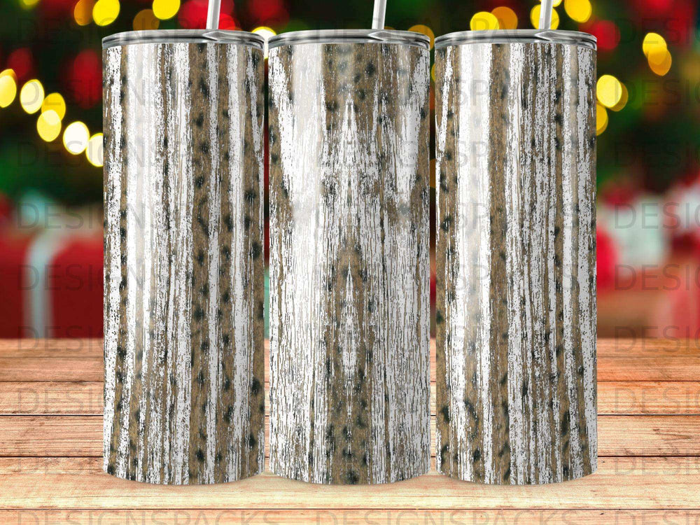 Three tumblers with a distressed wood grain pattern and bokeh background.