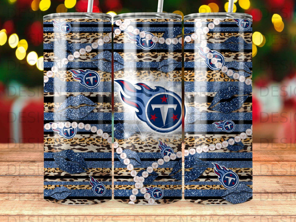 Tennessee Titans tumbler with leopard print, pearls, and stripes.