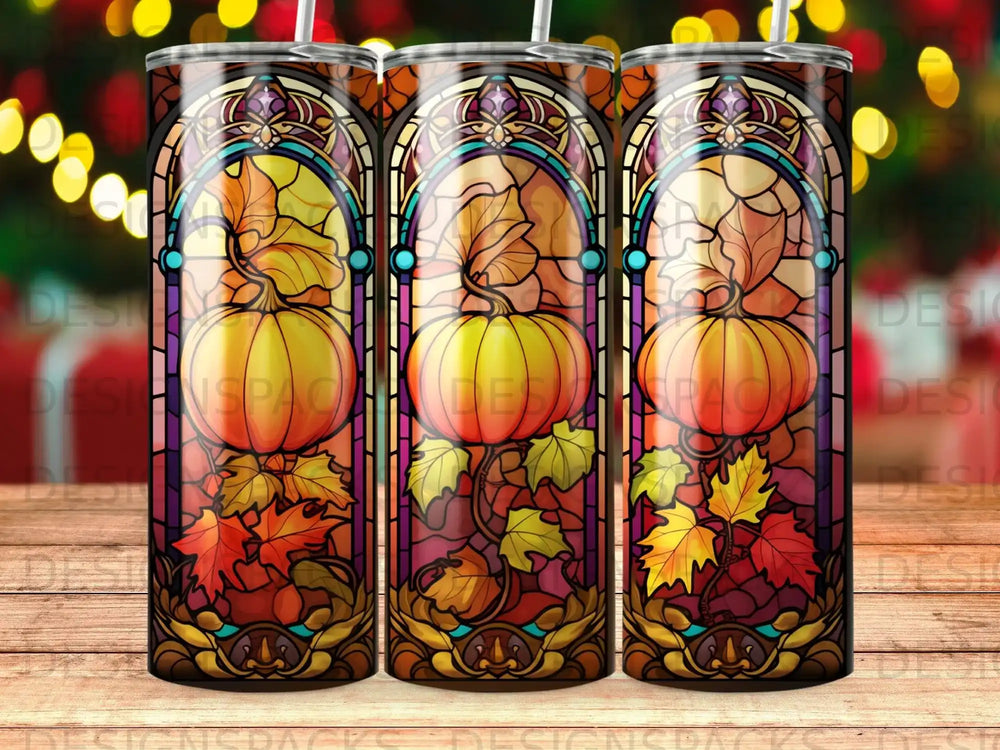Stained glass tumbler with pumpkins and autumn leaves design.
