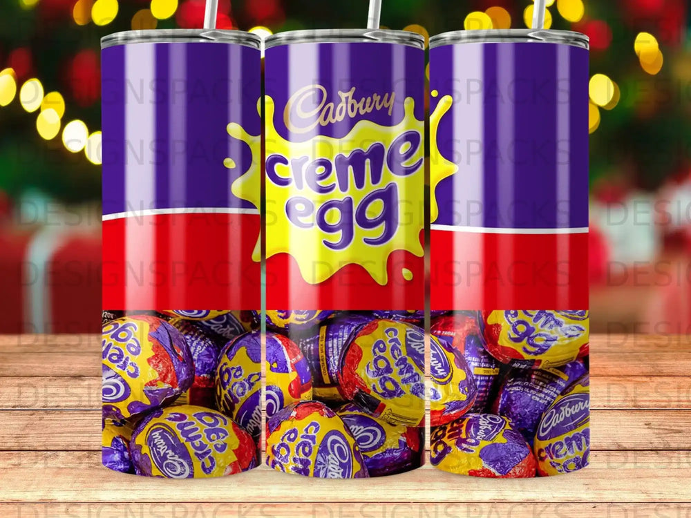 Cadbury creme egg pattern on a tumbler with blurry bokeh lights in background.