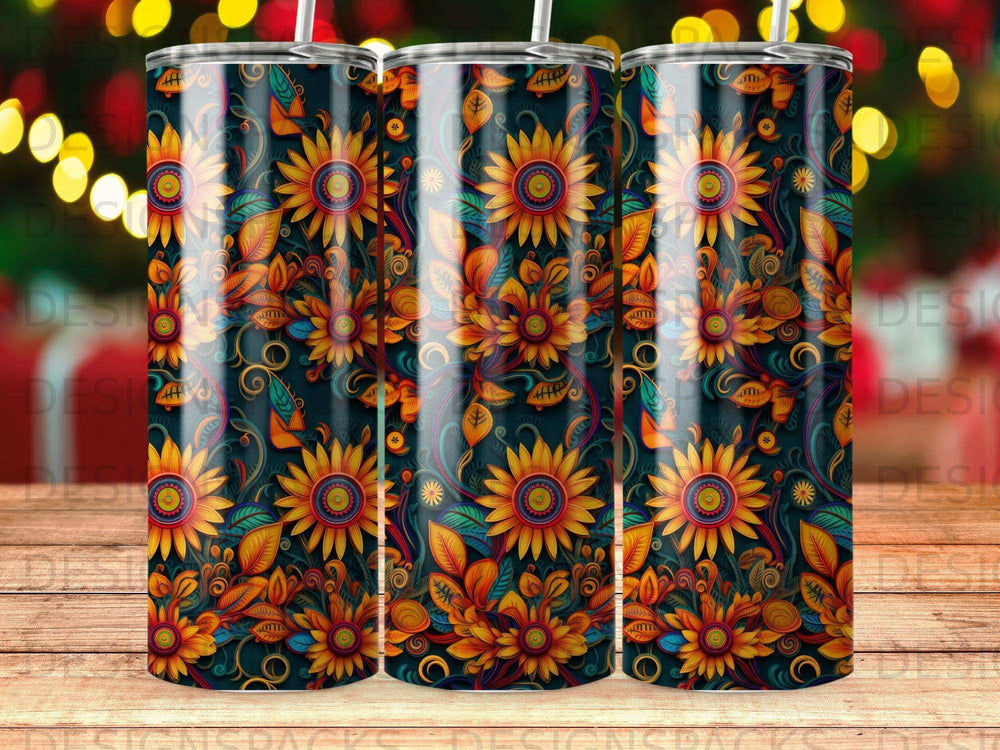 Sunflower and leaf pattern on three insulated tumblers.