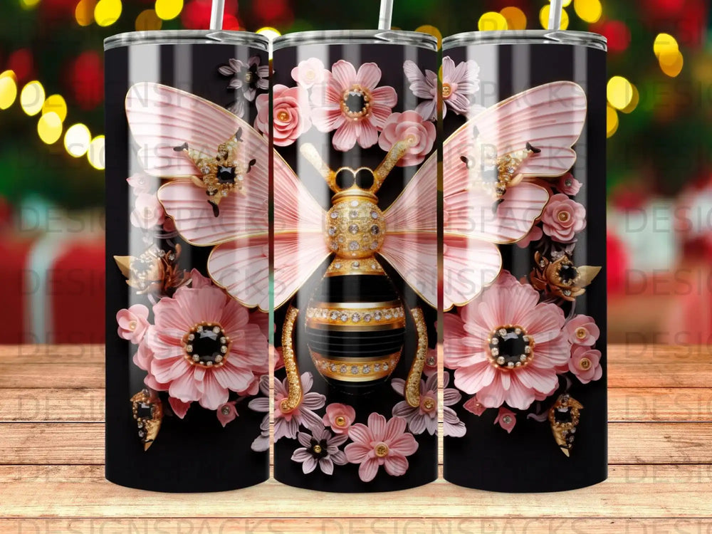 Pink and gold bee adorned with flowers on a black tumbler.