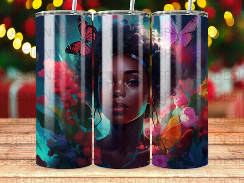 Woman with colorful butterflies and flowers on a tumbler.