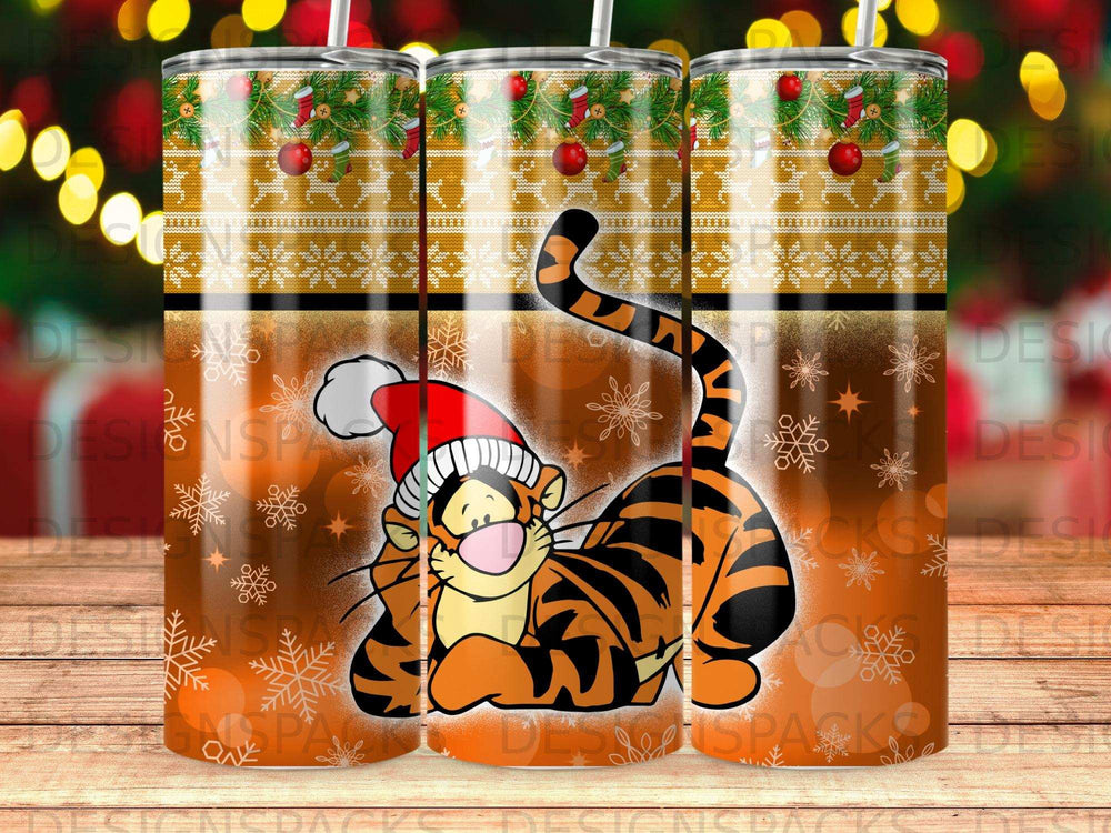 Tigger in a Santa hat on a Christmas-themed tumbler with snowflakes and ornaments.