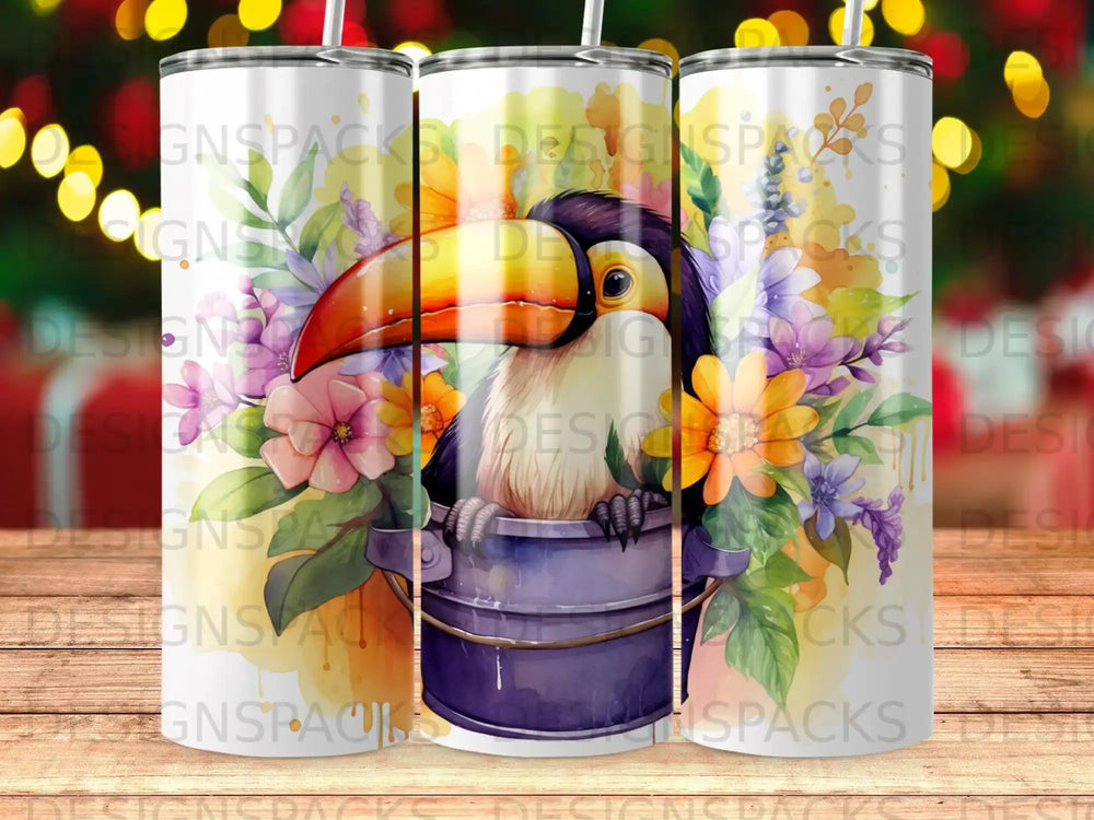 Toucan with bright beak sits in a bucket surrounded by colorful flowers.