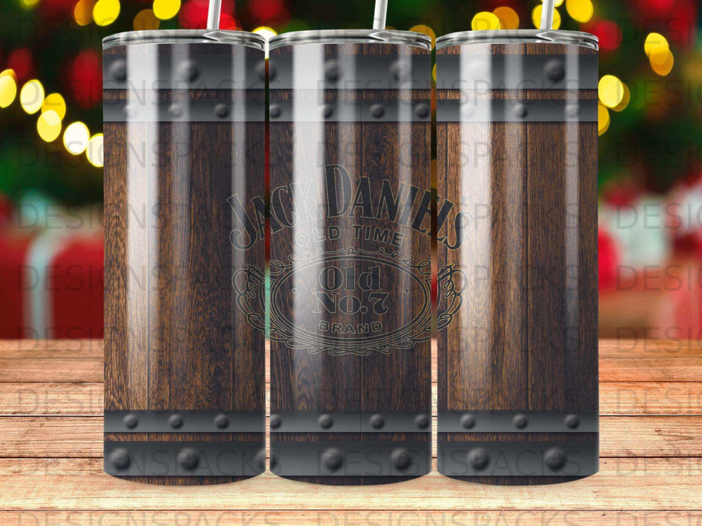 Jack Daniel's Old No. 7 Tennessee Whiskey barrel tumbler with festive bokeh background.