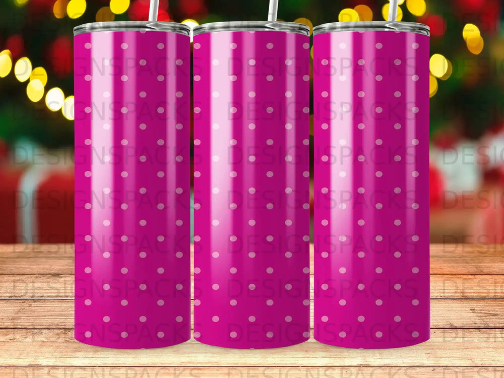 Three pink tumblers with a white polka dot pattern.