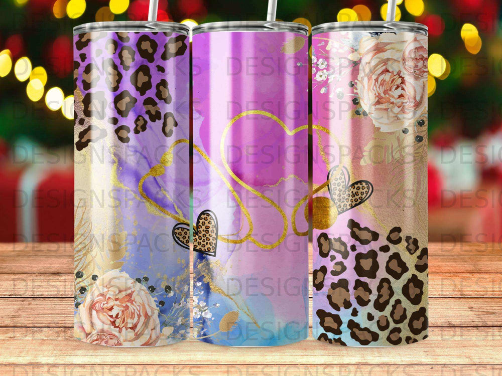 Three tumblers with floral, leopard print, and gold heart designs.