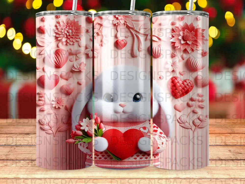 Pink floral tumbler with bunny holding a heart and bouquet.