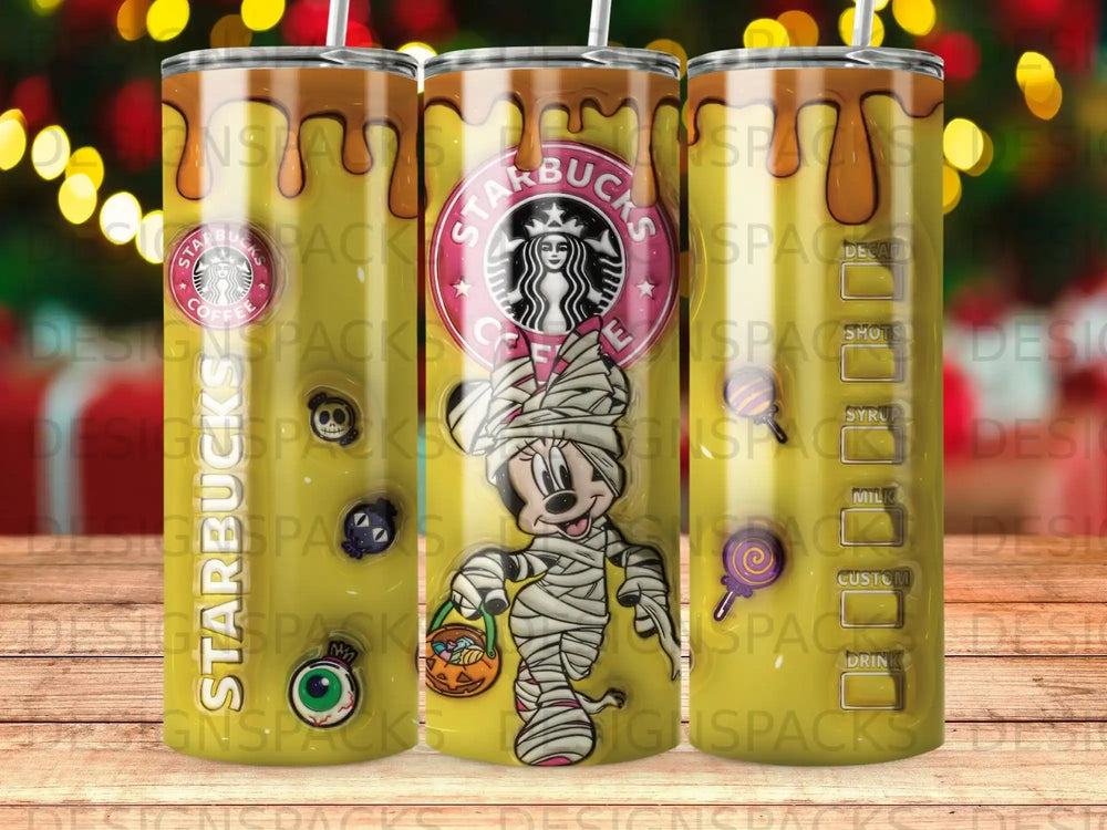 Starbucks tumbler featuring Mickey Mouse as a mummy with candy and Halloween motifs.