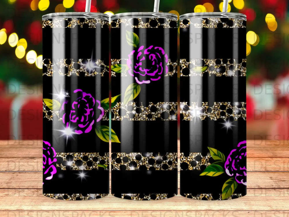 Black tumbler with purple floral design and gold glitter stripes.