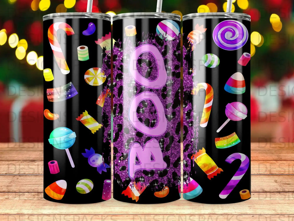 Spooky candy and lollipop pattern on a tumbler with "Boo" text.