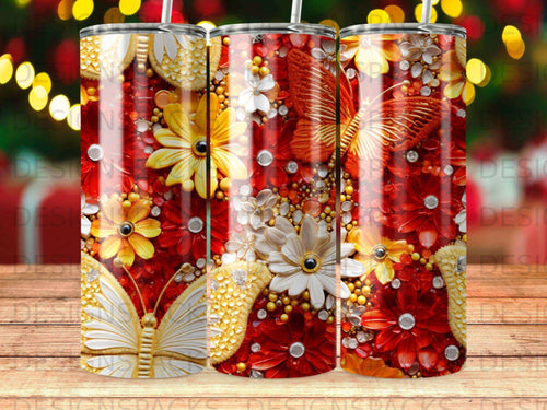 Three tumblers with floral and butterfly designs on a blurred bokeh background.