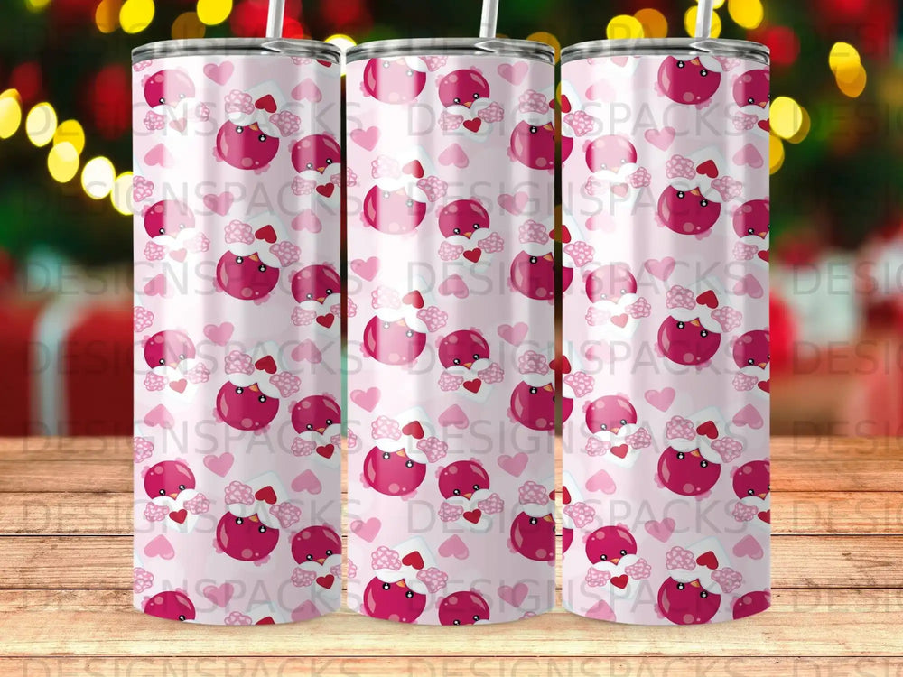 Pink tumbler with repeating pattern of a cartoon bear face with heart cheeks.