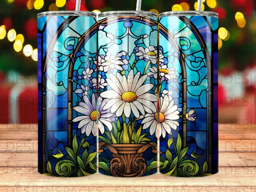 Stained glass panel with daisies in a vase against a blurred bokeh background.