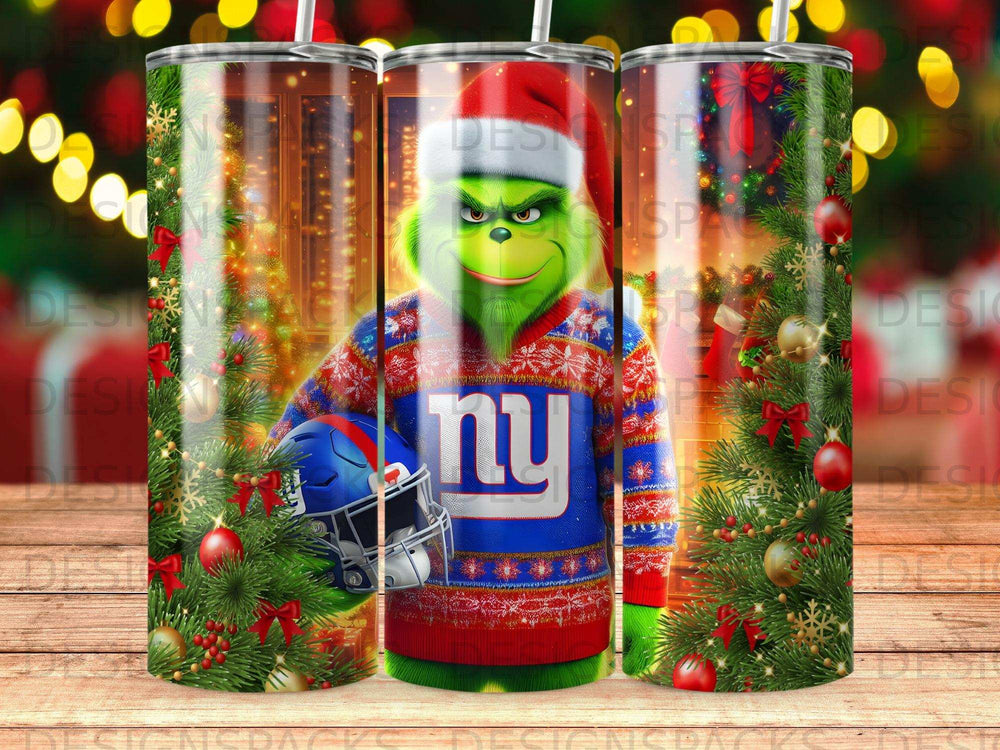 The Grinch in a New York Giants sweater holding a football.