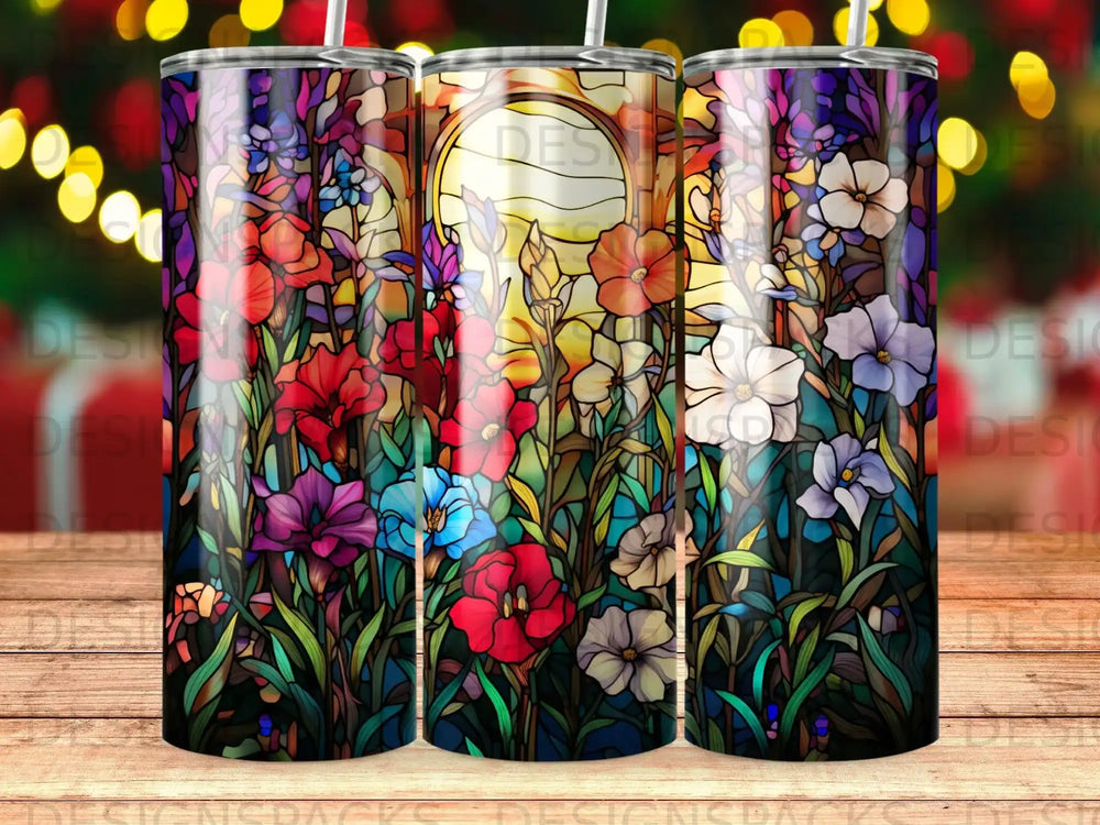 Stained glass floral pattern on a tumbler with bokeh lights in background.