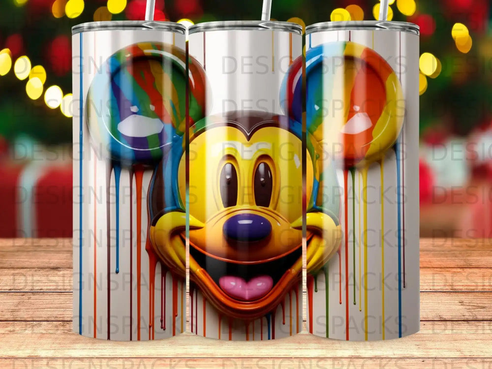 Mickey Mouse face with dripping rainbow paint on a white tumbler.