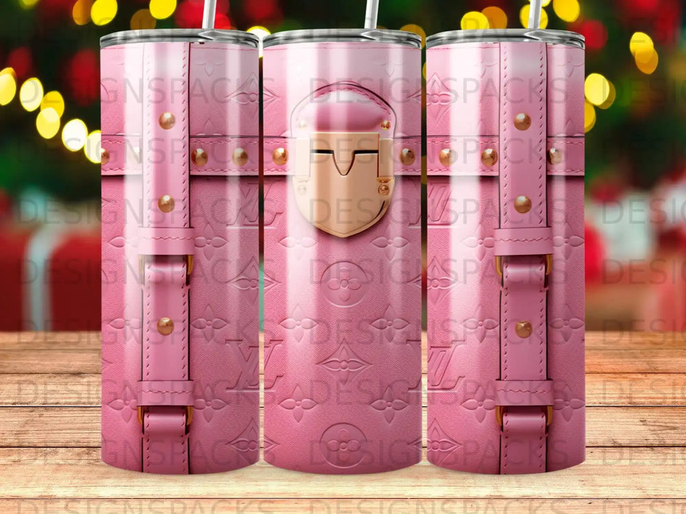 Pink leather textured tumbler with gold buckle detail and straw.