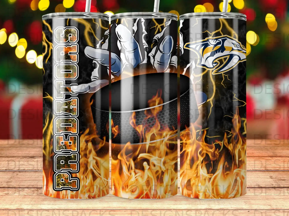 Nashville Predators logo on a tumbler with flames and a hockey puck.