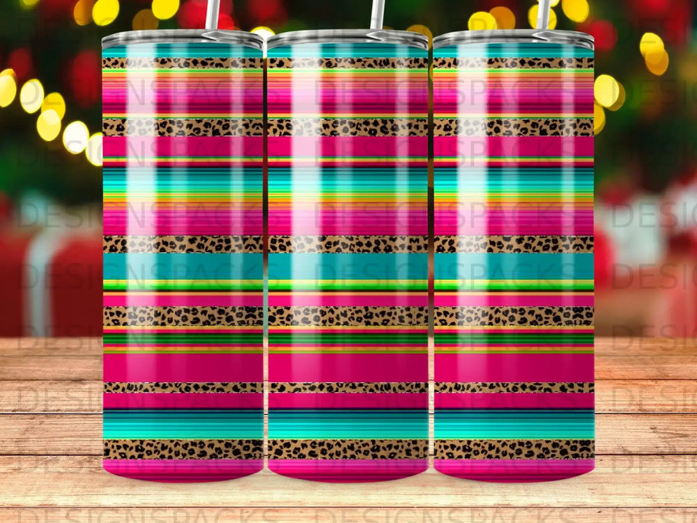 Tumbler with colorful stripes and leopard print pattern.