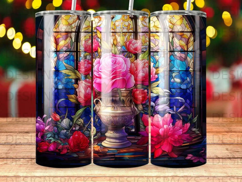 Stained glass window with pink flowers in a vase.