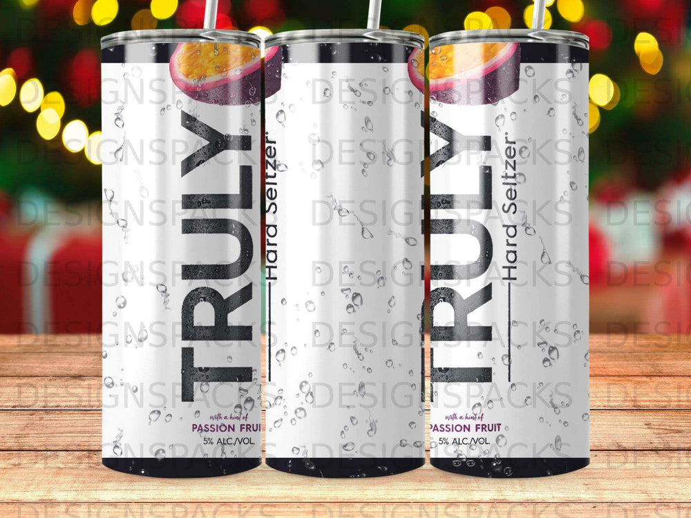Three Truly Hard Seltzer Passion Fruit cans with condensation and bokeh lights background.
