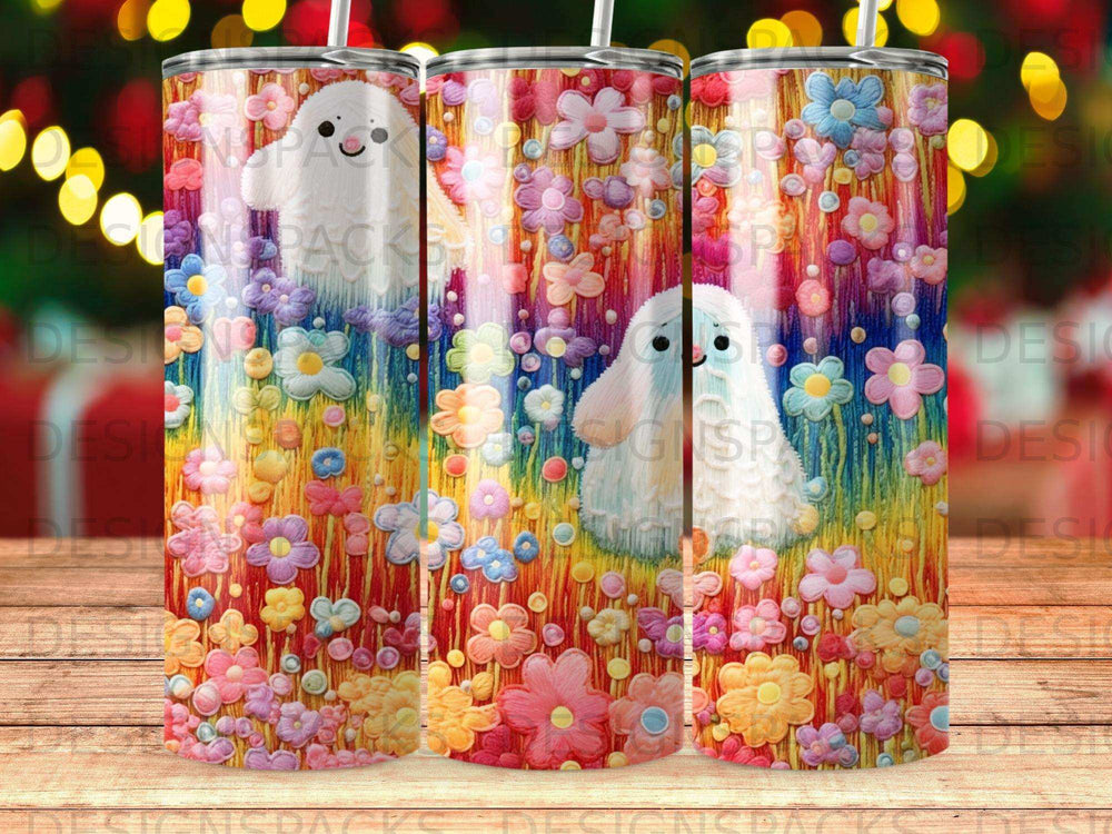 White ghost surrounded by colorful floral pattern on a tumbler.