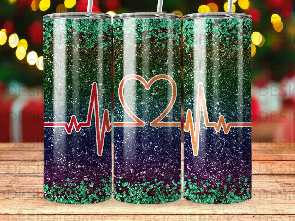 Three tumblers with a heartbeat EKG design and green glitter accent.