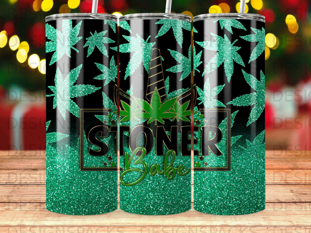 Tumbler with cannabis leaves and "Stoner Babe" text on a black background.