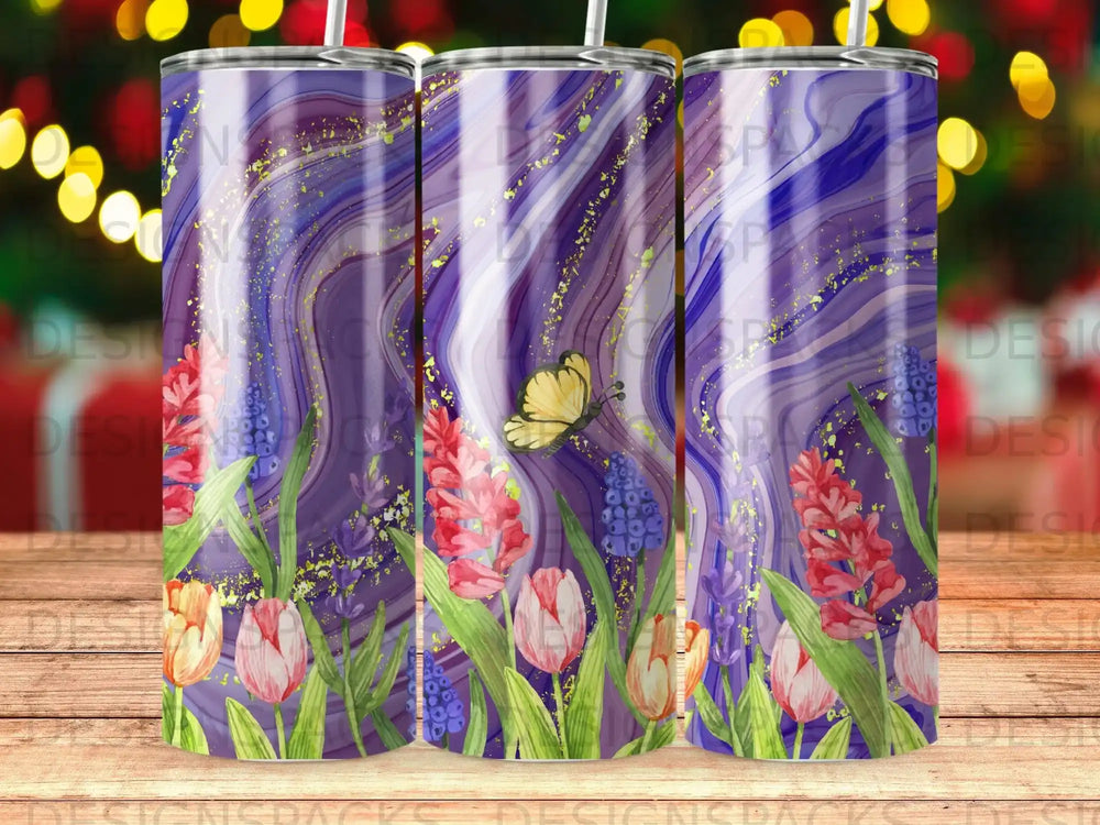 Purple watercolor tumbler with tulips, hyacinths, and a butterfly.