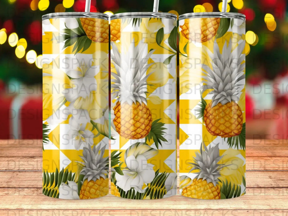 Yellow and white pineapple and floral pattern on a tumbler.