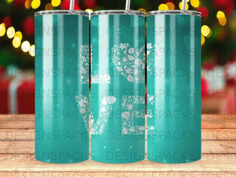 Green tumbler with "LOVE" spelled out in floral, patterned letters.