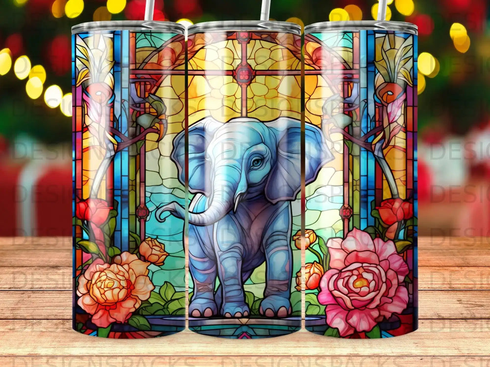 Stained glass elephant with roses and floral border on a tumbler.