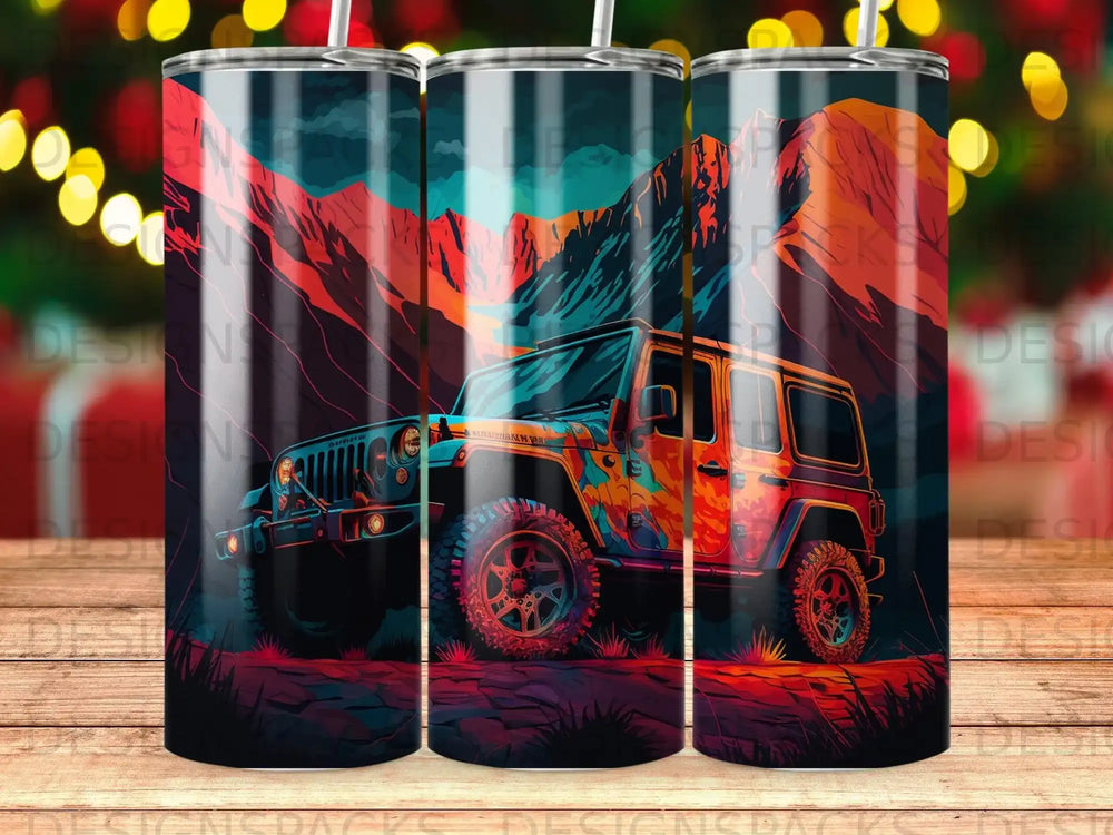 Colorful Jeep Wrangler driving through a mountainous landscape.
