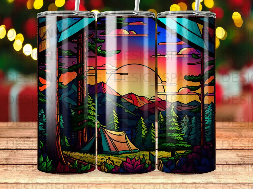 Sunset camping scene with mountains, pine trees, and a tent on a tumbler.