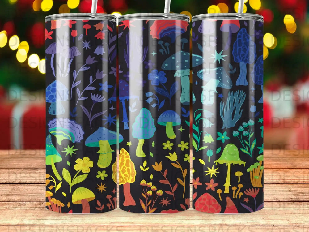 Tumbler with colorful mushrooms and floral pattern on a dark background.
