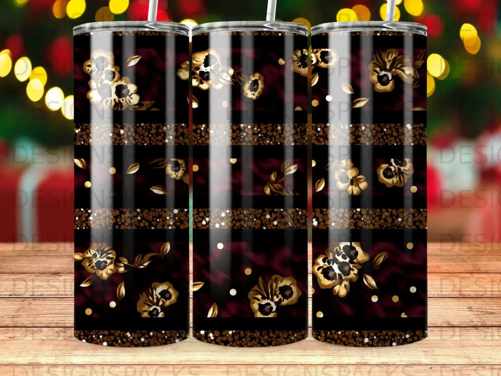 Dark tumbler with gold leopard print and floral accents.